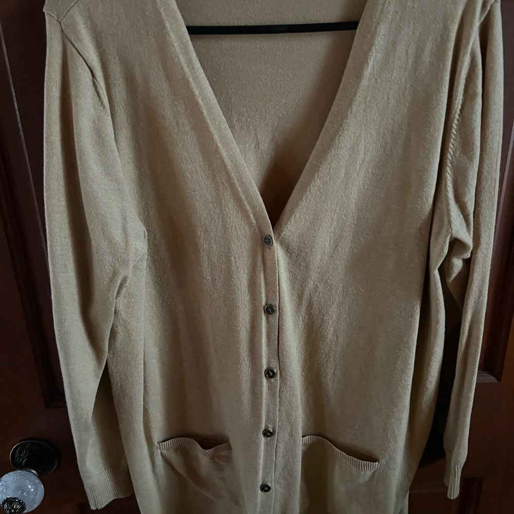 Maurice’s cardigan.